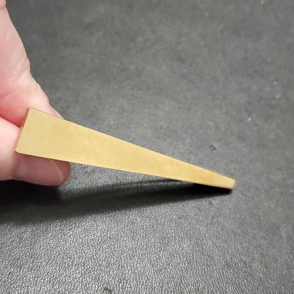 Marino gold tone triangular shaped brooch